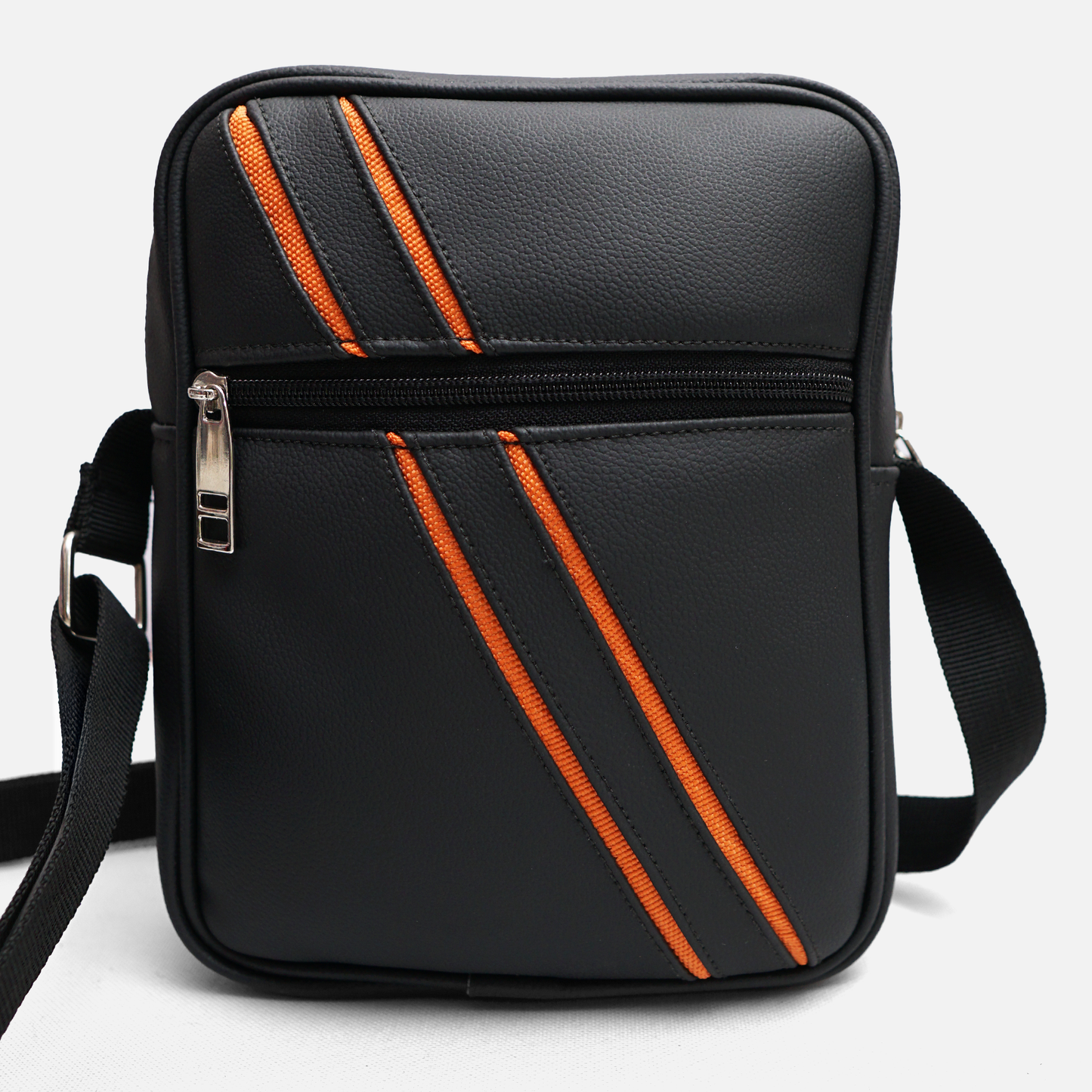 black crossbody bag side view with adjustable strap faux leather compact sling bag